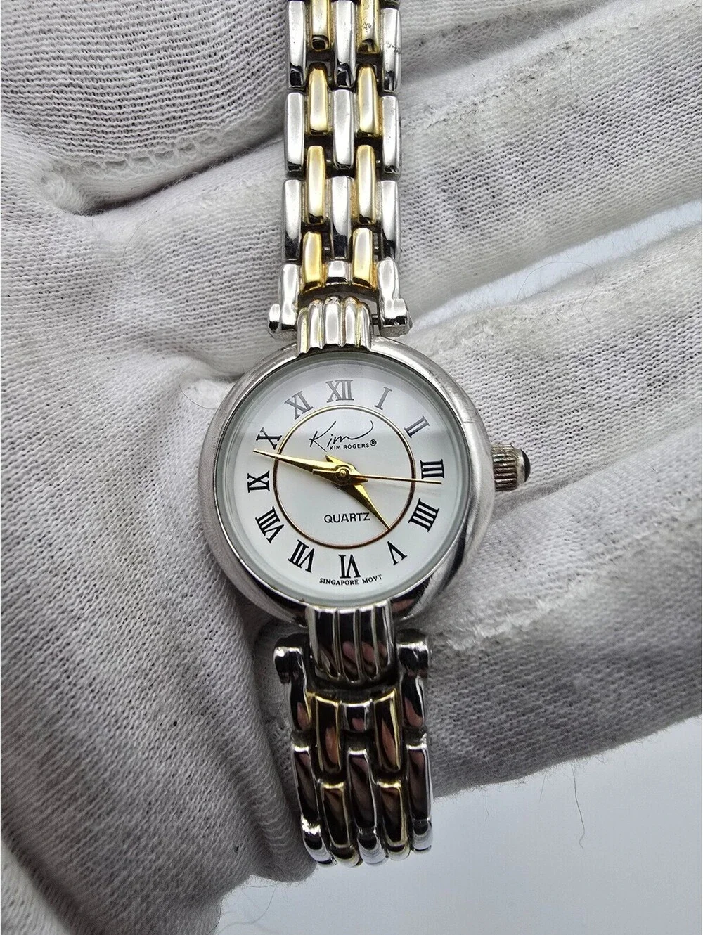 Kim Rogers Women’s Quartz Analog Wristwatch Two-Tone Bracelet White Roman Dial